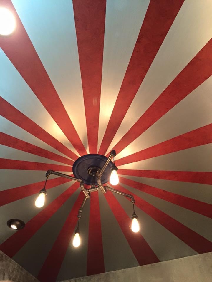 Fe Fi Faux Studios red radiating ceiling finish.